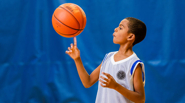 YMCA kid spins basketball