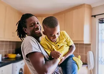 father and son playing