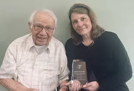 2025 Impact Award winner Dick Gilmore and Dawn Brennan