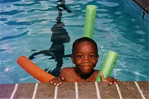 Green Hills Family YMCA History - Boy Swimming
