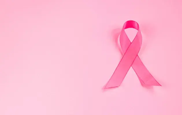 pink ribbon on pink background