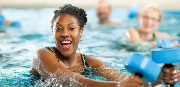 Woman exercising in pool
