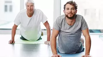 Men taking a yoga class